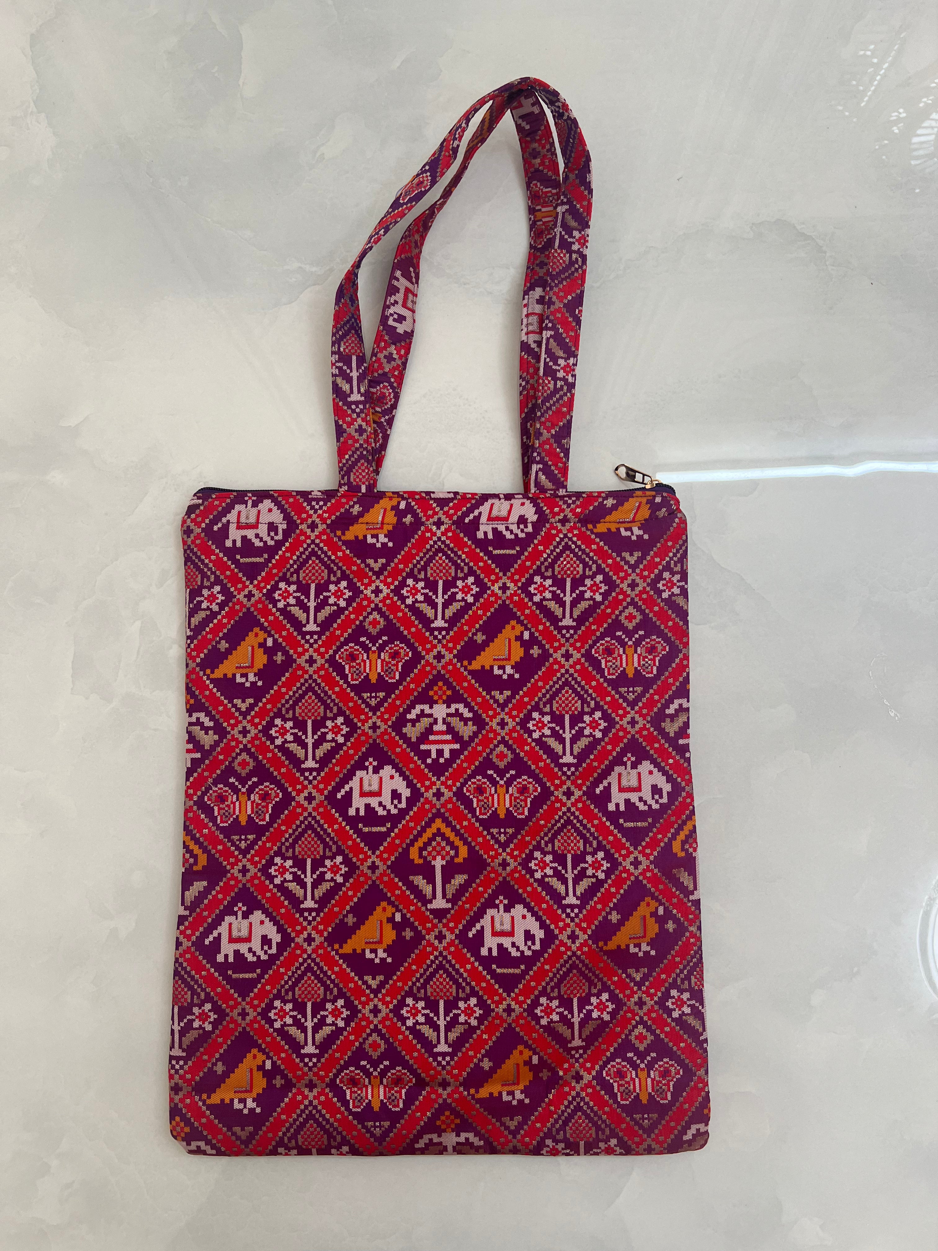 Patola print tote bag in rani pink with elephant motif